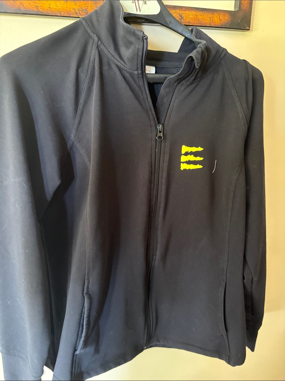 Danskin Now Black Jacket with Small Yellow Accent